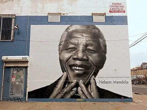 How does russia disregard the global principles of humanism that Nelson Mandela fought for almost 100 years ago?